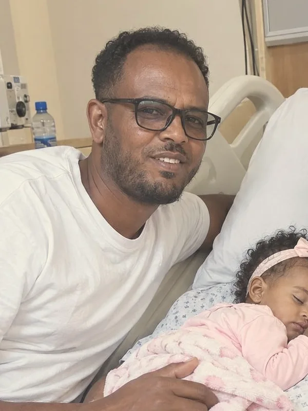 Abebe at the hospital, smiling